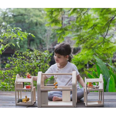 Plan Toys Slide N Go Dollhouse